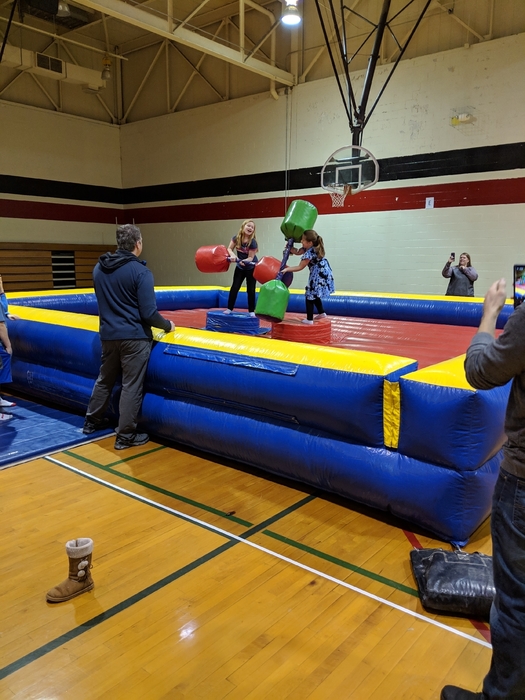 students jousting